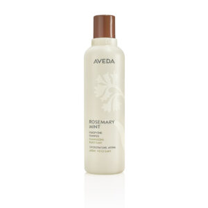 Beige cylindrical bottle of Rosemary Mint Shampoo with a brown cap and a floral graphic. - SAAB Salon Spa | Ottawa On, Canada
