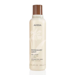 A tall, cylindrical bottle of Rosemary Mint Body Lotion featuring a brown cap and labels in English and French. - SAAB Salon Spa | Ottawa On, Canada