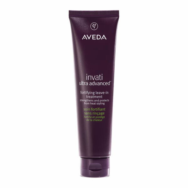 A tube of Invati Ultra Advanced Fortifying Leave-In Treatment, formulated to strengthen and protect hair from heat styling, comes in a sleek dark purple packaging. - SAAB Salon Spa | Ottawa On, Canada