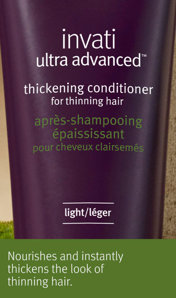 A bottle of Invati Ultra Advanced Thickening Conditioner - Light for thinning hair placed against a green background. Text on the bottle mentions it nourishes and thickens thinning hair immediately. - SAAB Salon Spa | Ottawa On, Canada