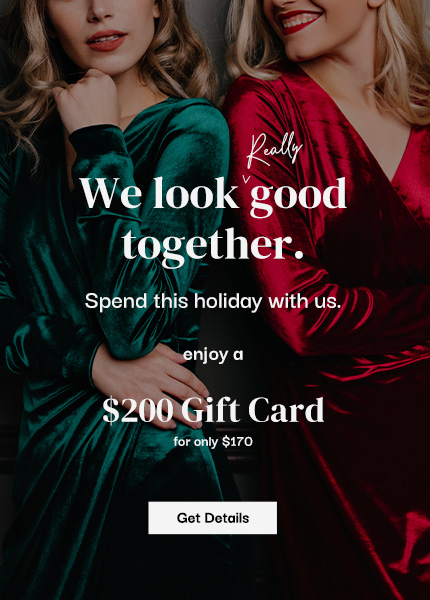 Two women in green and red velvet dresses stand side by side. Text advertises a $200 gift card for $170. - SAAB Salon Spa | Ottawa On, Canada