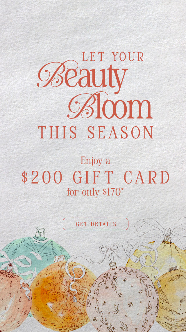 Promotional sign offering a $200 gift card for $170, decorated with pastel holiday ornaments and the text, "Let your beauty bloom this season. - SAAB Salon Spa | Ottawa On, Canada