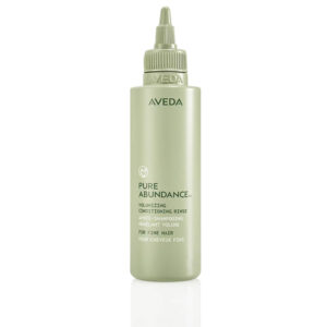 A green bottle of Pure Abundance Volumizing Conditioning Rinse for fine hair, designed with a pointed nozzle cap. - SAAB Salon Spa | Ottawa On, Canada