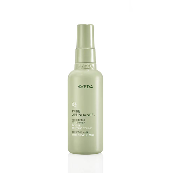 A green bottle of Pure Abundance Style Prep with text detailing its use for fine hair. - SAAB Salon Spa | Ottawa On, Canada