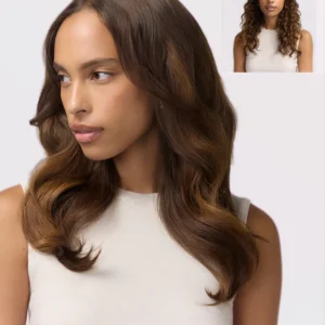 A woman with long, wavy brown hair styled by the T3 Aire360 looks to the side; an inset shows her natural, shorter curls. In both images, she wears a sleeveless cream top. - SAAB Salon Spa | Ottawa On, Canada