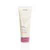 Off-white squeeze tube of Cherry Almond Softening Conditioner with a dark pink cap. - SAAB Salon Spa | Ottawa On, Canada