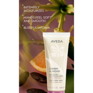 A tube of Cherry Almond Hand Relief Moisturizing Creme with text reading “Intensely moisturizes,” “Hands feel soft and smooth,” and “Blissful aroma,” displayed in front of botanical imagery. - SAAB Salon Spa | Ottawa On, Canada