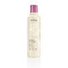 Cylindrical bottle of Cherry Almond Softening Shampoo with a purple cap and light beige label featuring floral graphics and text. - SAAB Salon Spa | Ottawa On, Canada