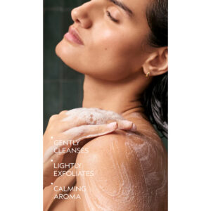 Person with eyes closed using a Shampure Bath Bar to lather their shoulder in a shower, with text that reads: “Gently cleanses, lightly exfoliates, calming aroma.” - SAAB Salon Spa | Ottawa On, Canada